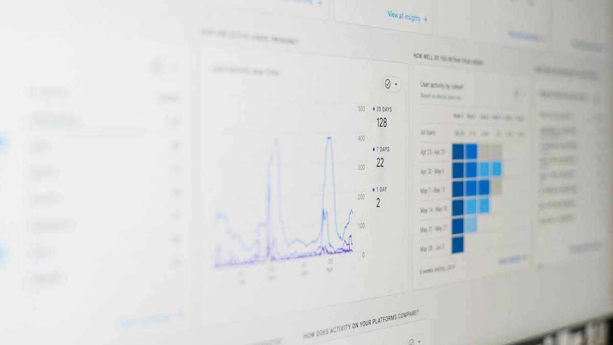 Side-by-side comparison of project management software tools tracking methods with productivity metrics