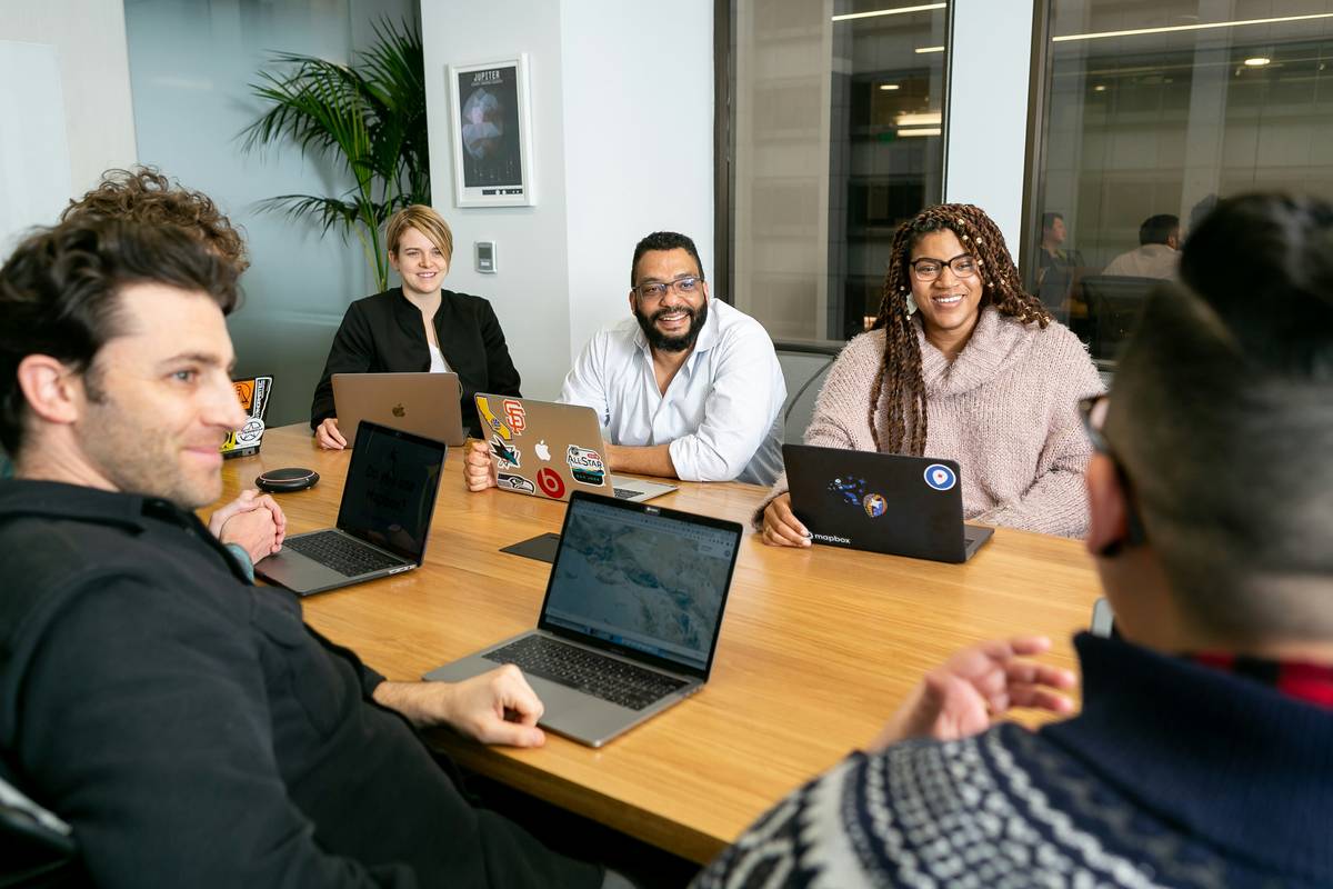 Dashboard view of team collaboration project management software also showing shared tasks, chat, and file previews